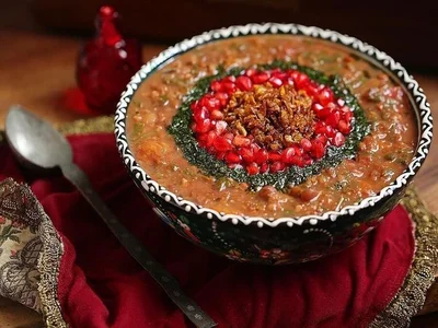 1. آش رشته – تاج نگین غذاهای خیابانی ایرانی در زمستان - 1. Ash Reshteh – The Crown Jewel of Iranian Street Food in Winter