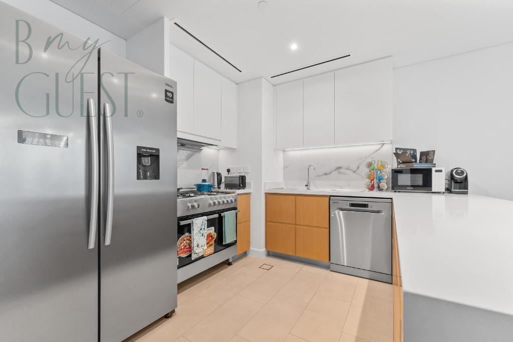 Unwind in style in La Vie 2BR with Beach Access