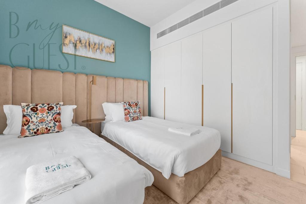 Unwind in style in La Vie 2BR with Beach Access