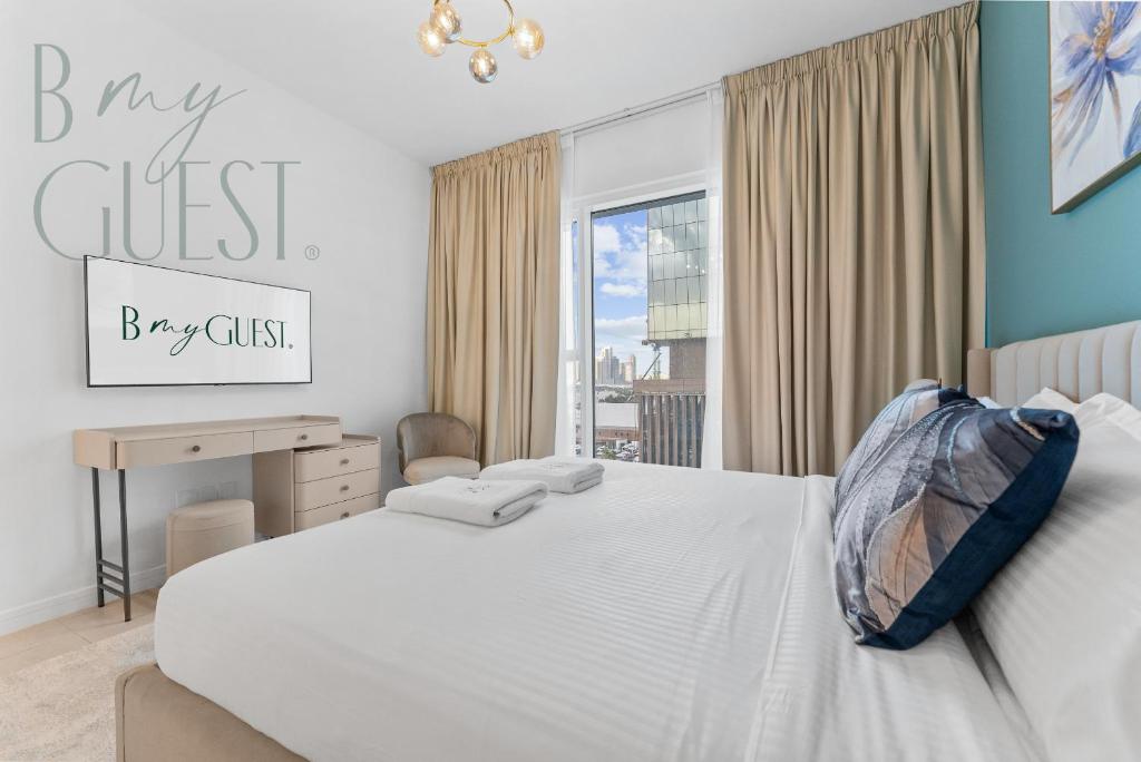 Unwind in style in La Vie 2BR with Beach Access