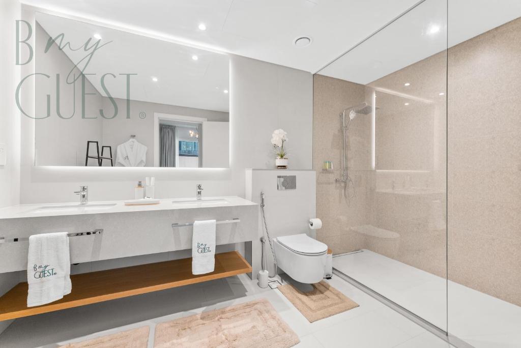 Unwind in style in La Vie 2BR with Beach Access