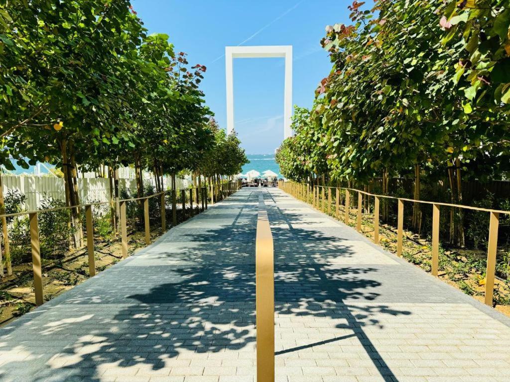 Unwind in style in La Vie 2BR with Beach Access