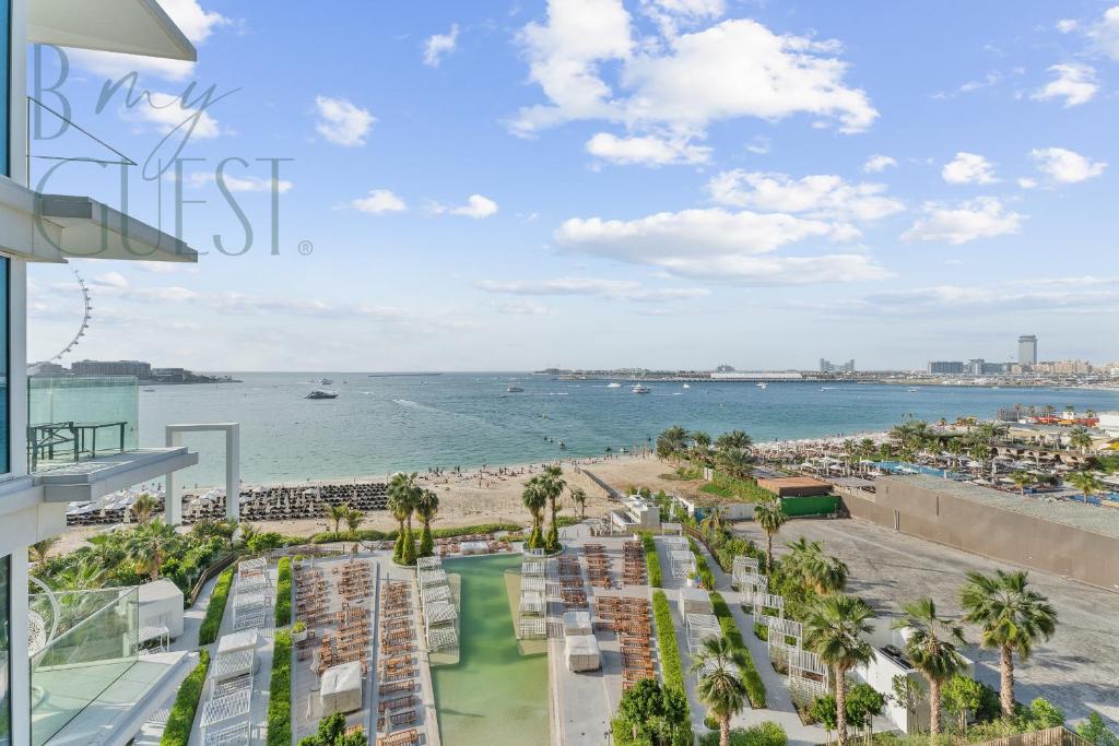 Unwind in style in La Vie 2BR with Beach Access