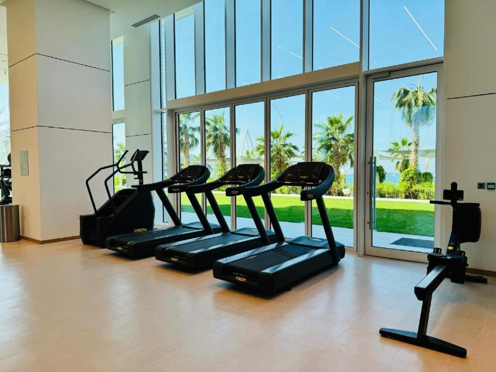 Unwind in style in La Vie 2BR with Beach Access