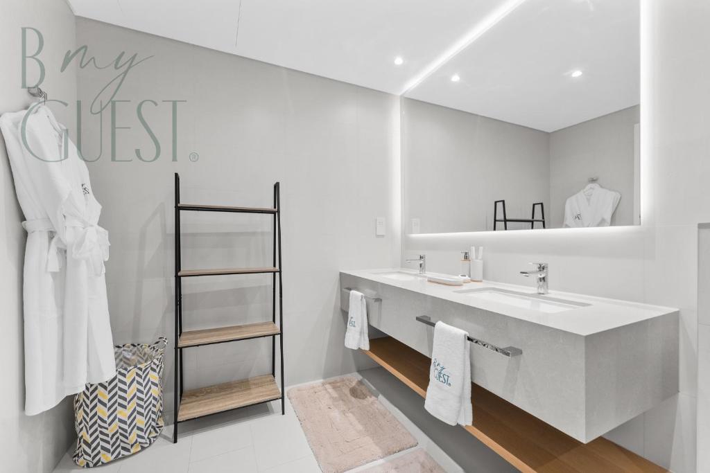 Unwind in style in La Vie 2BR with Beach Access