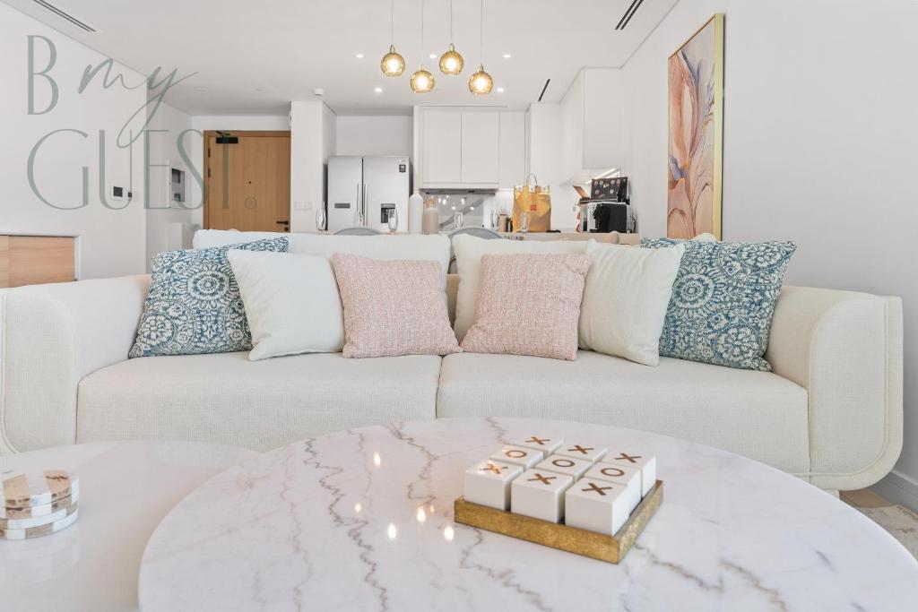 Unwind in style in La Vie 2BR with Beach Access