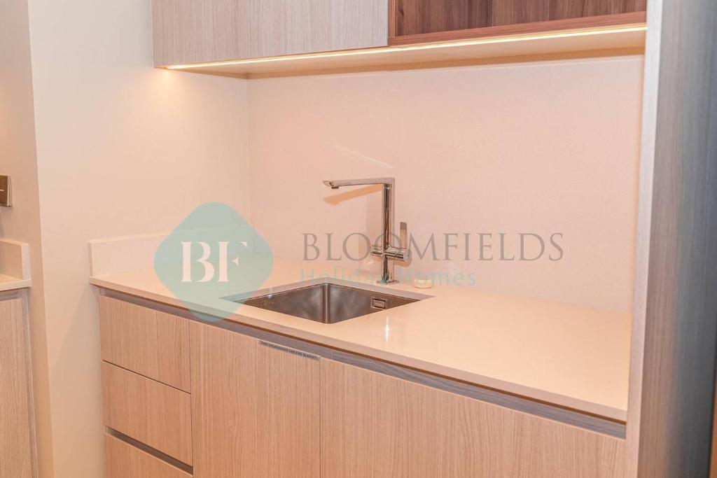هتل بلومفیلدز ۱بر ویدا کریک بیچ برج خلیفه ویو - Bloomfields 1br Vida Creek Beach Burj Khalif View