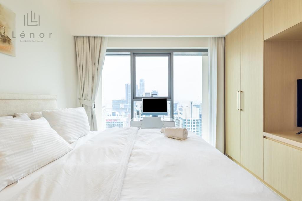 هتل استانینگ داون‌تاون ۱ بی‌اچ‌کی - رودتوب فاونتین ویوز - Stunning Downtown 1BHK - Rooftop Fountain Views