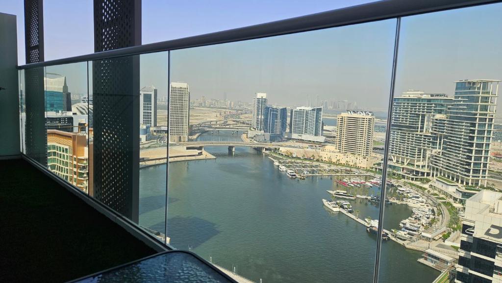 هتل ام اچ - رِوا - ۱بی اچ کی - کَنال ویو - رِف ۲۶۱۲ - MH - REVA- 1BHK - Canal View - REF 2612
