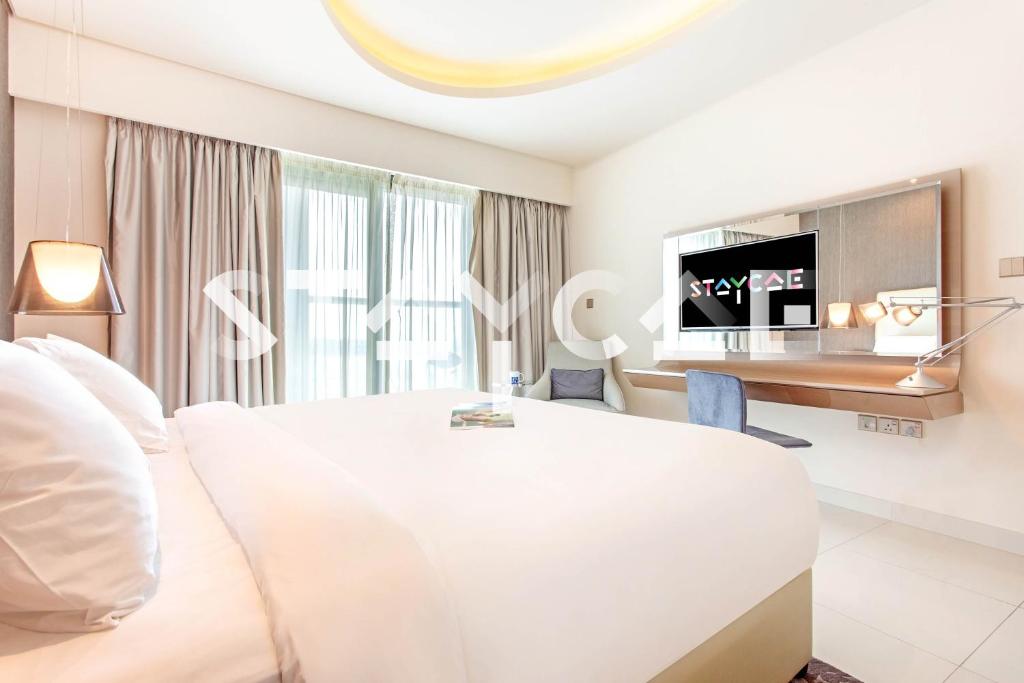 هتل استیکا هالی دی هومز - داماک تاورز بای پارامونت - Staycae Holiday Homes - Damac Towers By Paramount