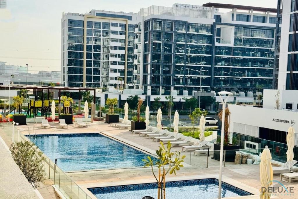 هتل کامفی ۱ بی آر این آزی زی ریویرا ۸، محمد بن راشد سیتی بای دلاکس هالیدی هومز - Comfy 1BR in Azizi Riviera 8, Muhammad bin Rashid City by Deluxe Holiday Homes