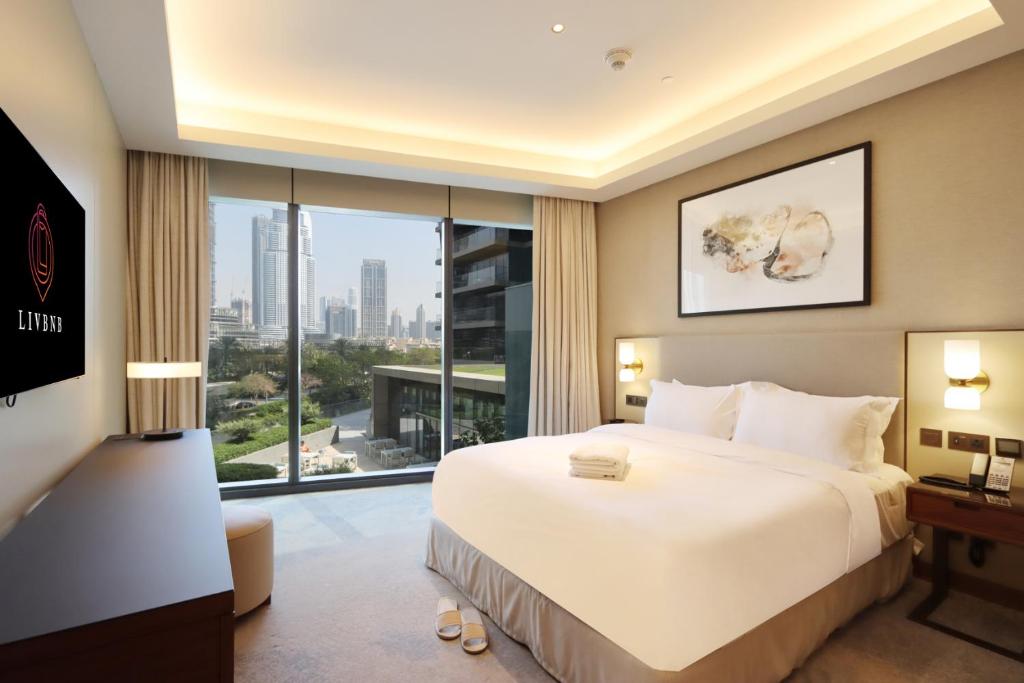 هتل لیو بی ان بی ۳ بی آر و/ برج خلیفه ویو، هارت آف داون تاون - Livbnb 3BR w/ Burj Khalifa View, Heart of Downtown
