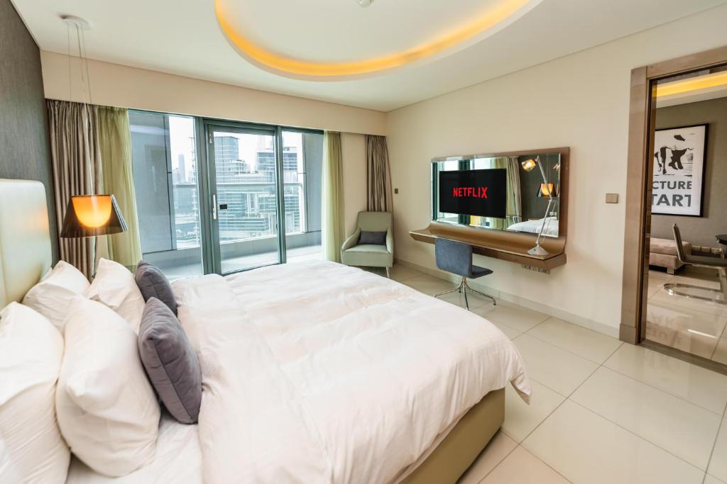 هتل اکسکلوosive 1بی آر اپت ویت برج خلیفه ویوز - Exclusive 1BR Apt with Burj Khalifa Views