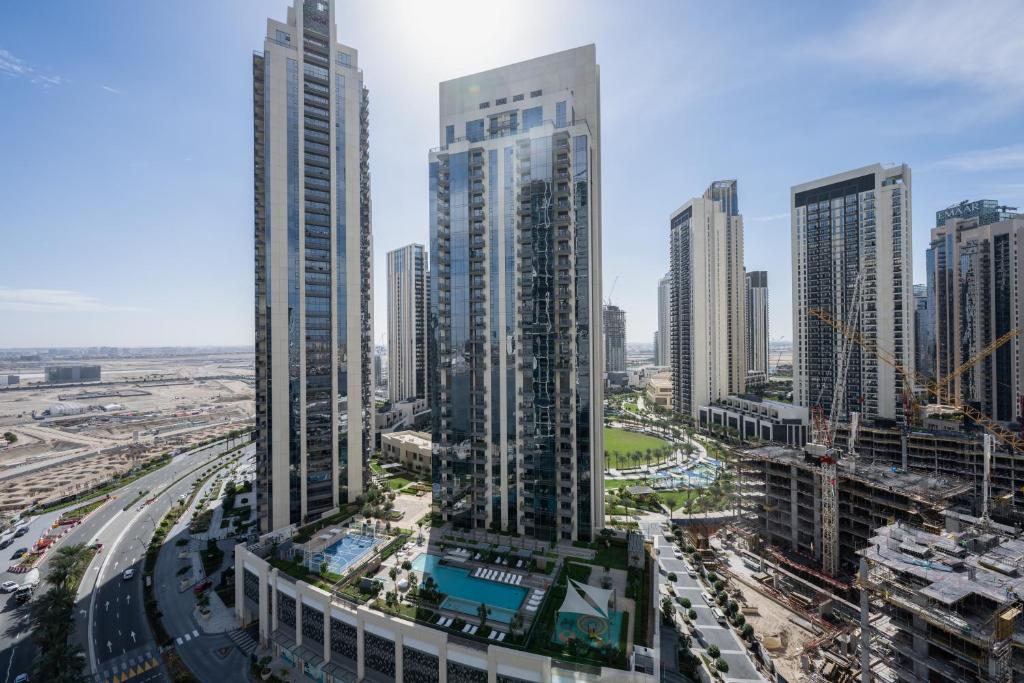 هتل کوزی ۱ بی آر این کریک اج استونینگ بی ویو سویمینگ پول - Cozy 1BR in Creek Edge Stunning Bay View Swimming Pool