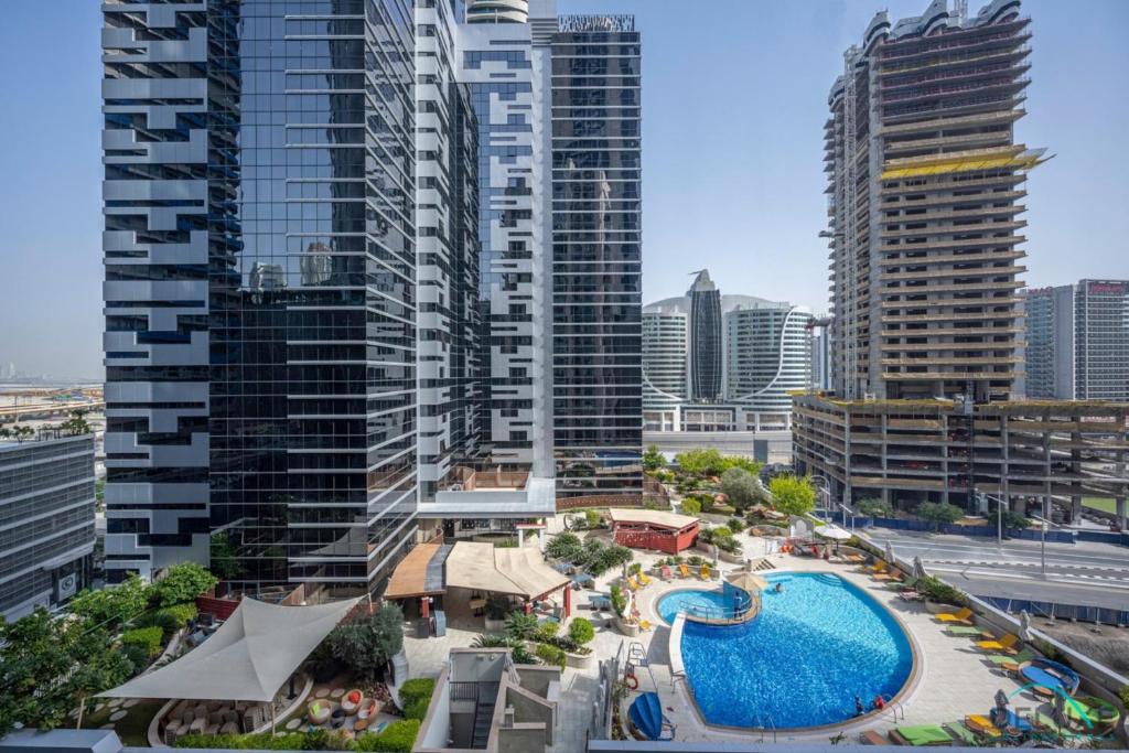 Gorgeous 1BR Apartment in Dunya Tower, Downtown Dubai by Deluxe Holiday Homes