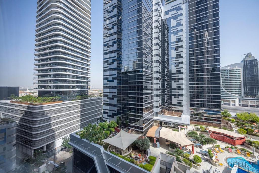 Gorgeous 1BR Apartment in Dunya Tower, Downtown Dubai by Deluxe Holiday Homes