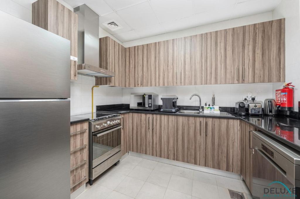 Gorgeous 1BR Apartment in Dunya Tower, Downtown Dubai by Deluxe Holiday Homes