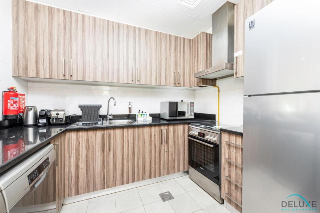 Impressive 1BR Apartment in Dunya Tower, Downtown Dubai by Deluxe Holiday Homes