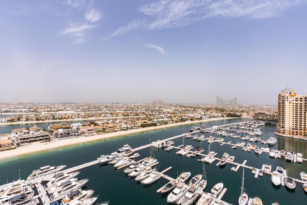 Exclusive Home on Palm West with Private Beach