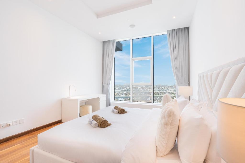 Exclusive Home on Palm West with Private Beach