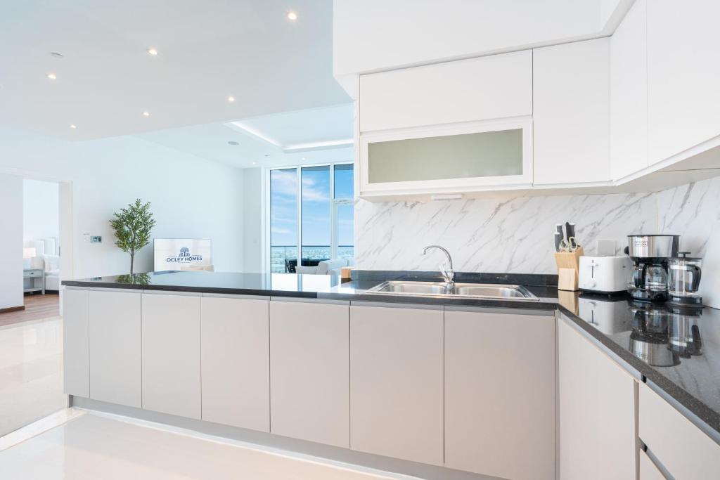 Exclusive Home on Palm West with Private Beach