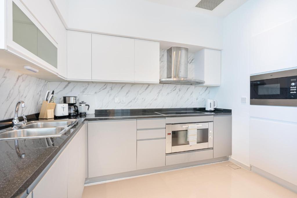 Exclusive Home on Palm West with Private Beach