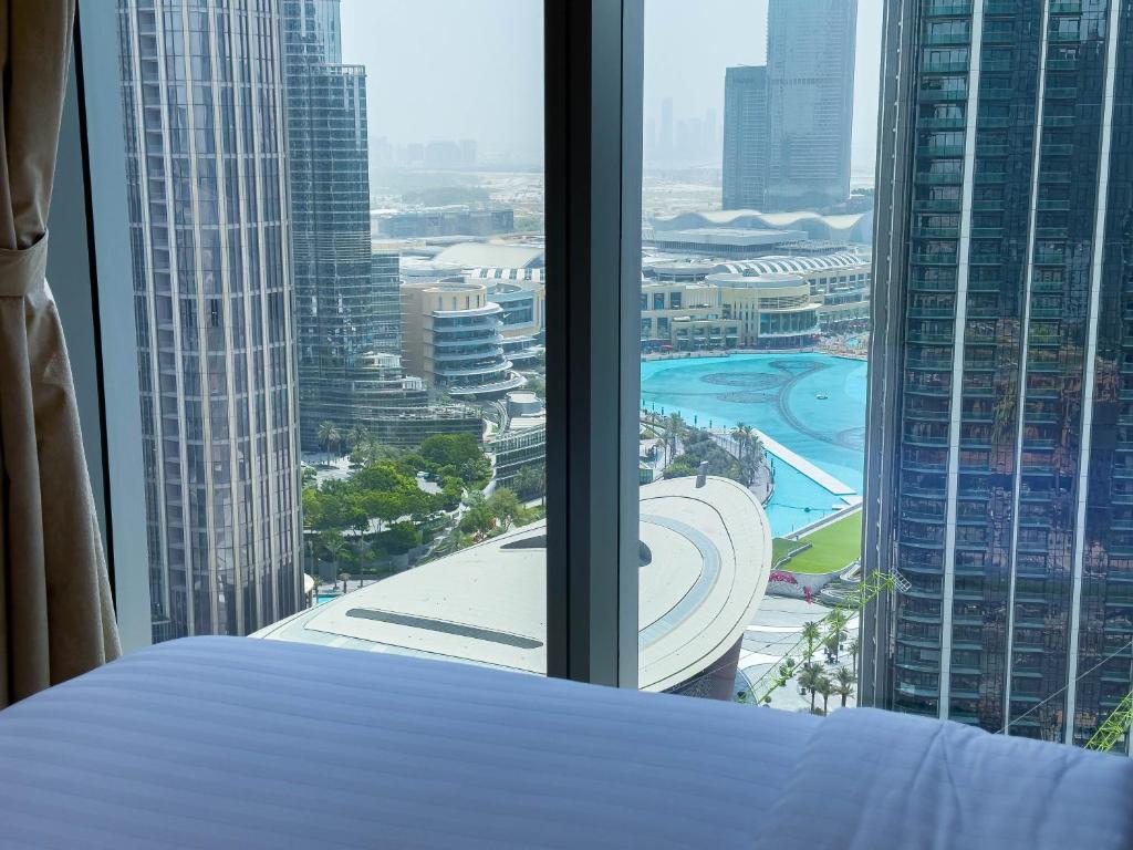 Naseem - Downtown Gem 4BR Apt: Burj View Bliss