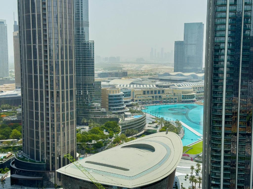 Naseem - Downtown Gem 4BR Apt: Burj View Bliss