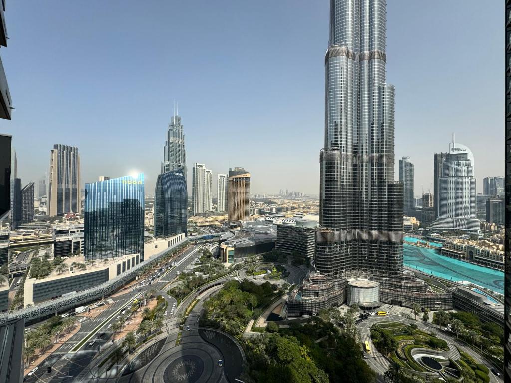 هتل منزیل -3BR این آدرس اوپرا با برج و فونتین ویو - Manzil -3BR in Address Opera with Burj & Fountain View
