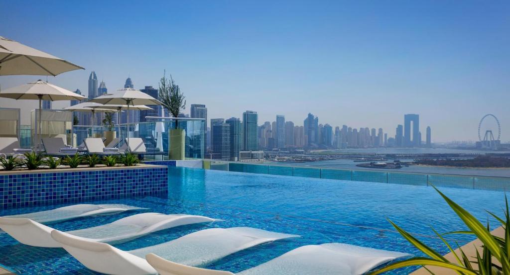 هتل دلاکس سی ویو آپارتمان پالم جمیرا دبی ویت پرایوت بیچ اند روف تاپ پل - Deluxe Sea View Apartment Palm Jumeirah Dubai with private Beach and Rooftop pool