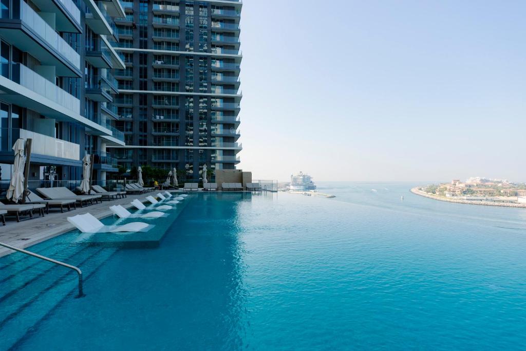 هتل بیچفرانت الیگنت 2 بی دی کاندو ویت بریتکنگ ویوز - 15 ای بی 01 - Beachfront Elegant 2BD Condo with Breathtaking Views -15AB01