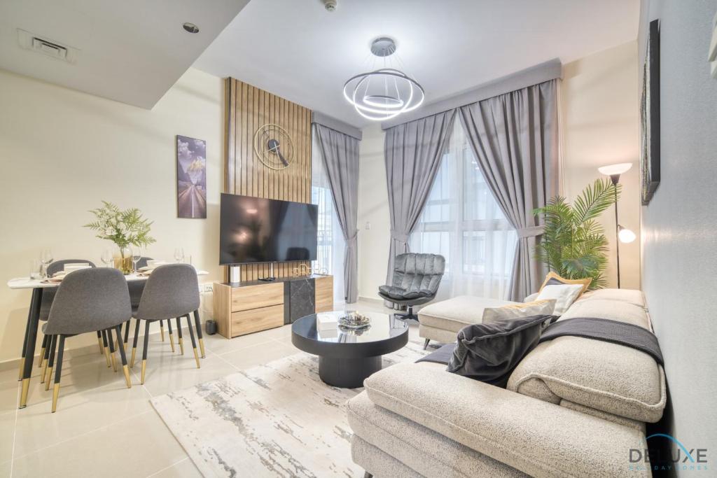 هتل کامفی 1BR آپارتمان در می ریزیدنسز جی وی سی بای دلاکس هالی دی هومز - Comfy 1BR apartment in May Residences JVC by Deluxe Holiday Homes