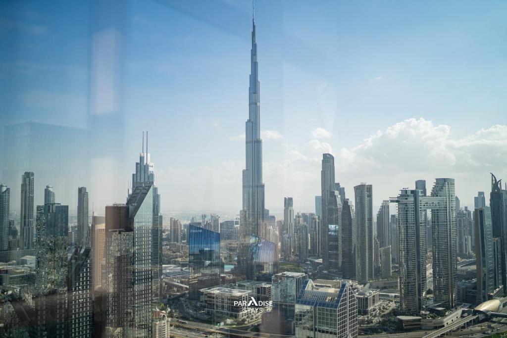 هتل بُرج خلیفه ویوز - های فُلوُر وِد سی اند سیتی ویوز - اِيه اِيه تاوِر - Burj Khalifa Views - High Floor with Sea & City Views - AA Tower