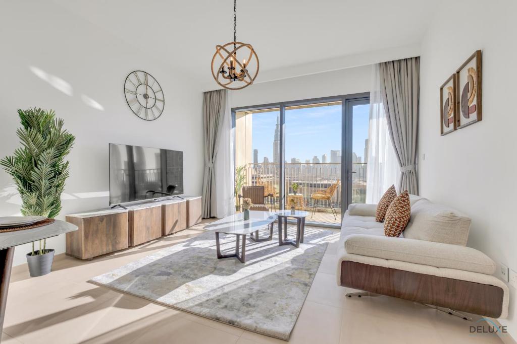 هتل گورجس 2 بی آر آپارتمان این داونتاون ویوز 2 داونتاون دبی بای دلاکس هالیدی هومز - Gorgeous 2BR Apartment in Downtown Views II Downtown Dubai by Deluxe Holiday Homes