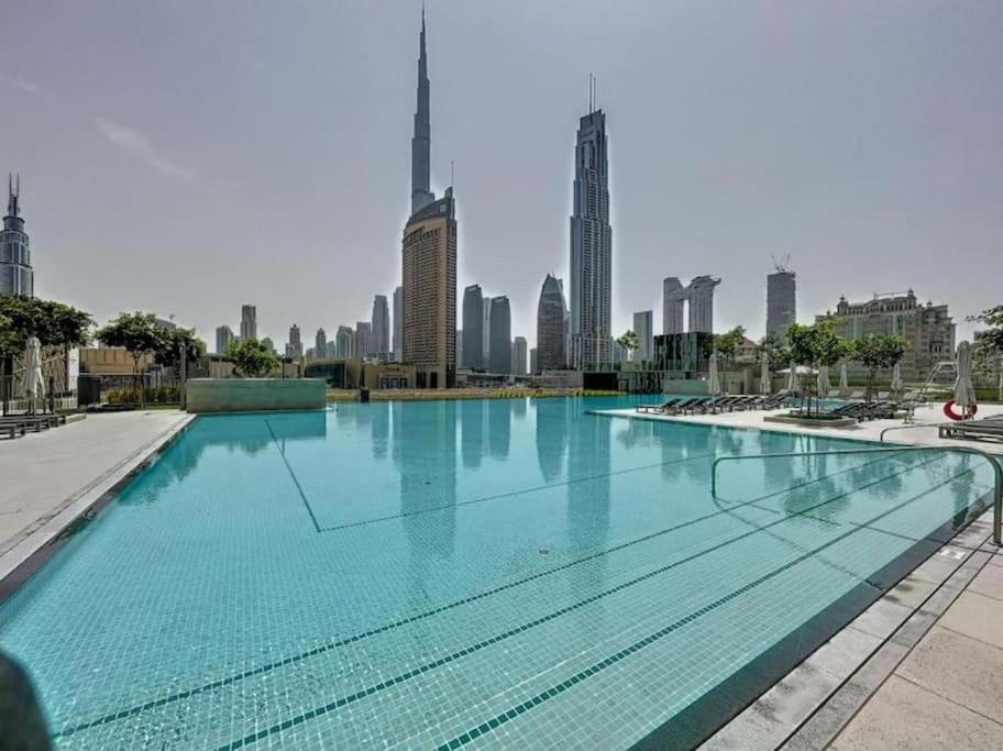 هتل سوپرهوست - داونتاون دیلایت 2BR آپت اوپوزیت برج خلیفه - SuperHost - Downtown Delight 2BR Apt Opposite Burj Khalifa