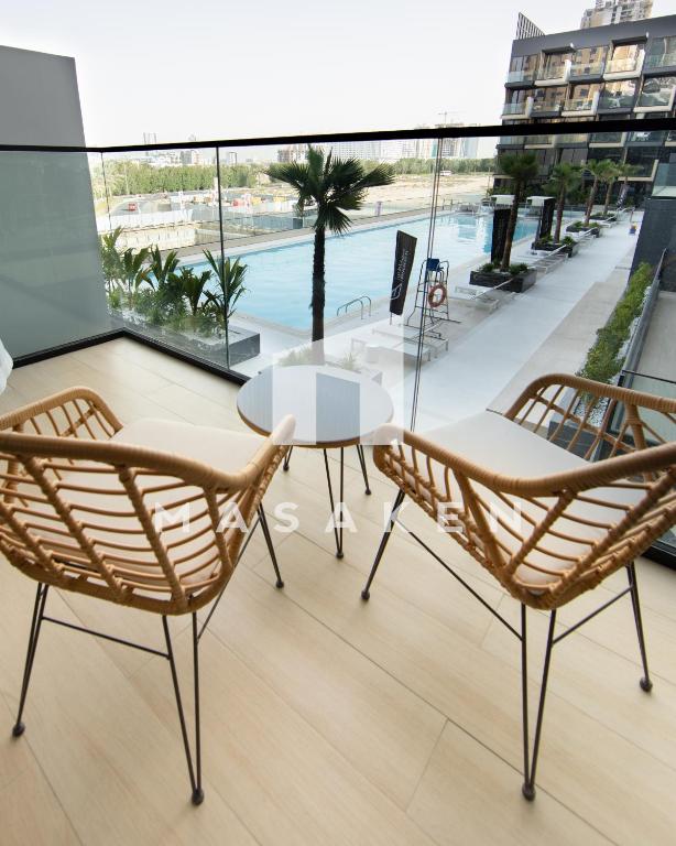 هتل اسپیشس 1 بد روم این جی وی سی و بالکنی اند پول ویو - Spacious 1 Bedroom In Jvc W Balcony & Pool View