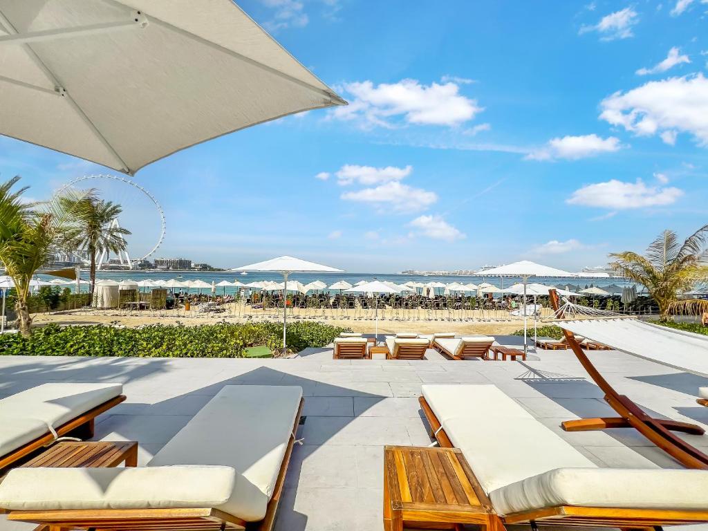 هتل فام لیوینگ - مدرن 1-بد روم جم در جی بی آر، استپز فروم د بیچ - FAM Living - Modern 1-Bedroom Gem in JBR, Steps from the Beach