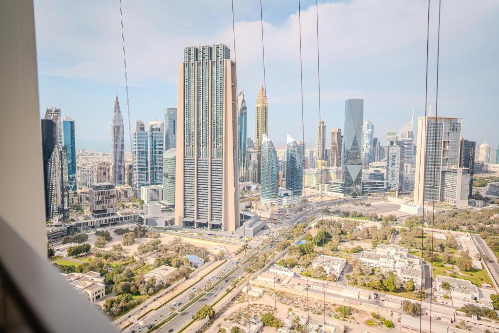 هتل ستا نینگ سیتی ویوز 1 بی دی آر فست وای فای پول اند جیم - Stunning City Views 1BDR Fast Wi-Fi Pool & Gym