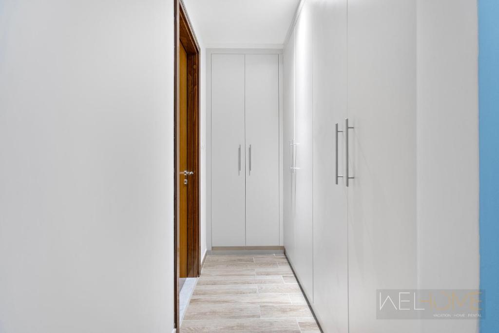 WelHome - Luxurious 2BR Apt at Noora Tower in Business Bay