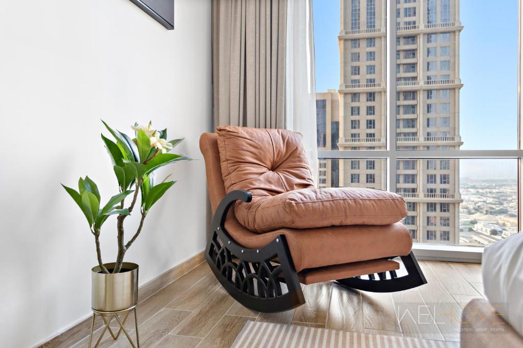 WelHome - Luxurious 2BR Apt at Noora Tower in Business Bay