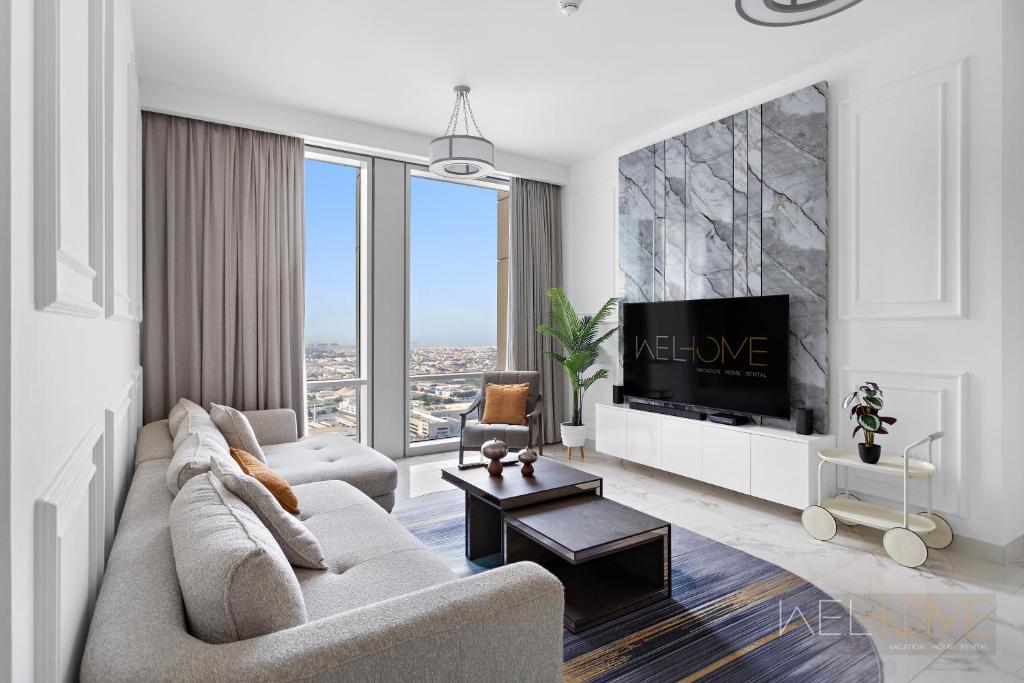 WelHome - Luxurious 2BR Apt at Noora Tower in Business Bay