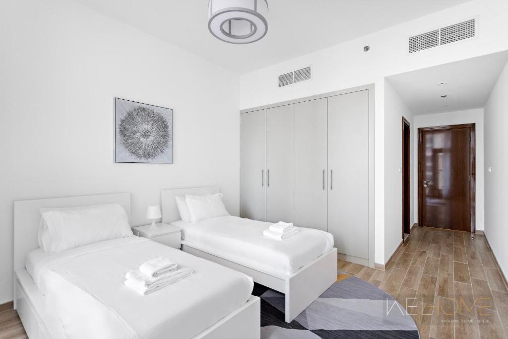 WelHome - Luxurious 2BR Apt at Noora Tower in Business Bay