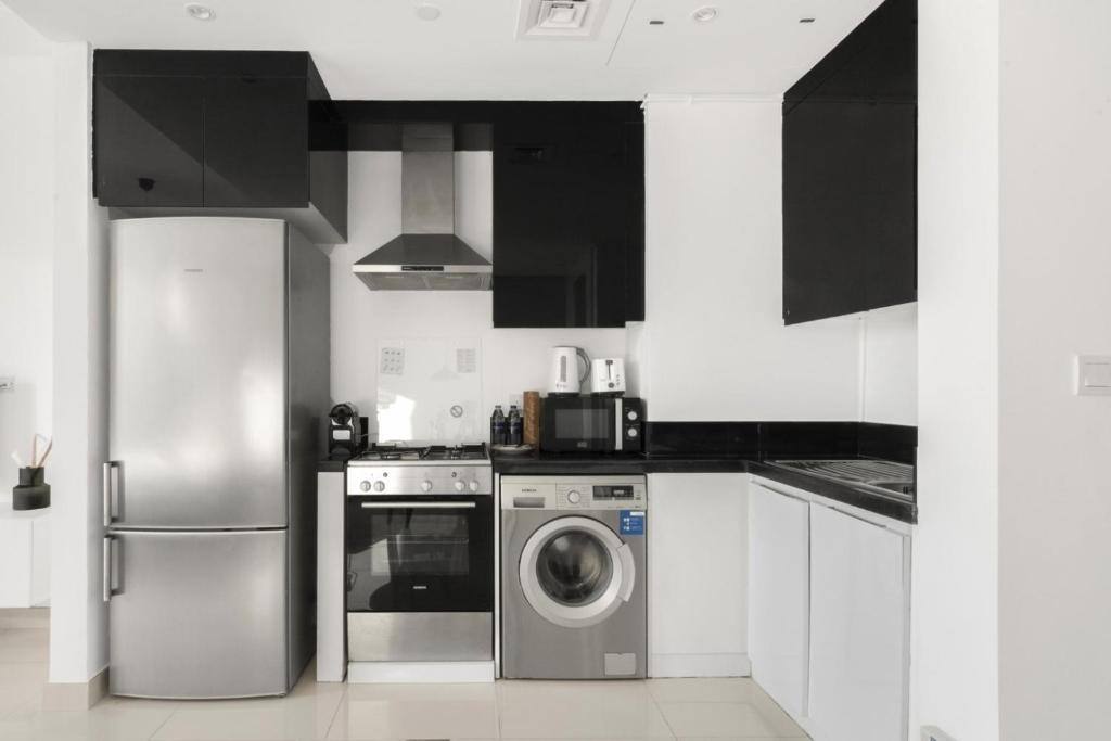 GuestReady - Cinza Moderna com Piscina e Ginásio