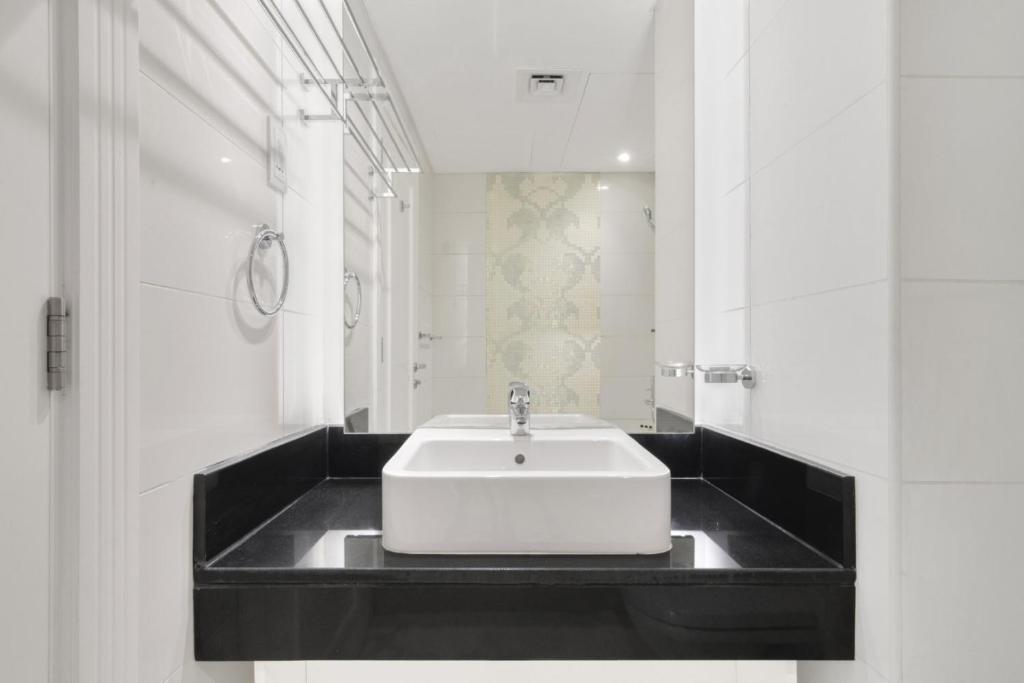 GuestReady - Cinza Moderna com Piscina e Ginásio