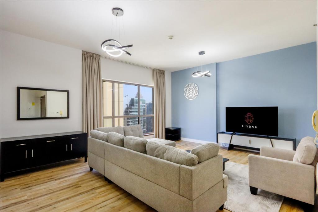 هتل لیو بی ان بی - 3+1 در جی بی آر، نزدیک به ساحل با ویو از چشمه - Livbnb - 3+1 in JBR, Close to Beach w/ Ain View
