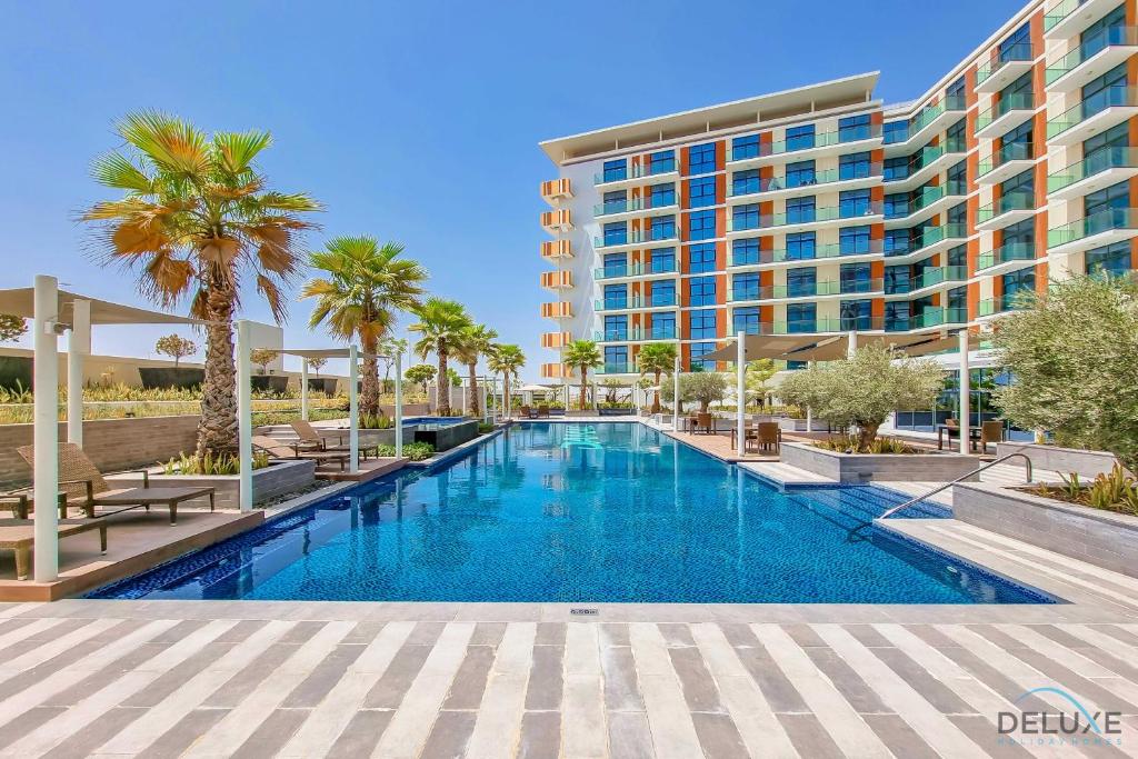 هتل کوردیال 1BR در سلستیا بی دبی ساوت بای دلاکس هالیدی هومز - Cordial 1BR at Celestia B Dubai South by Deluxe Holiday Homes