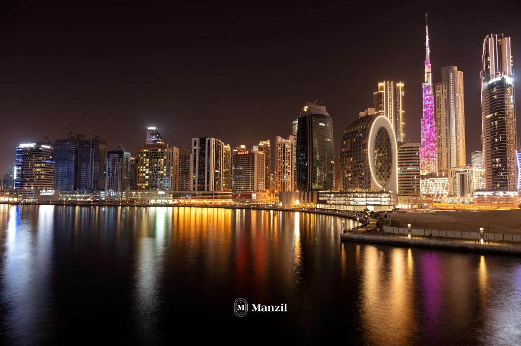 هتل منزل - 1BR در بیزنس بی با کانال ویو، نزدیک به برج و دبی مال - Manzil - 1BR in Business Bay with Canal View, Close to Burj & Dubai Mall