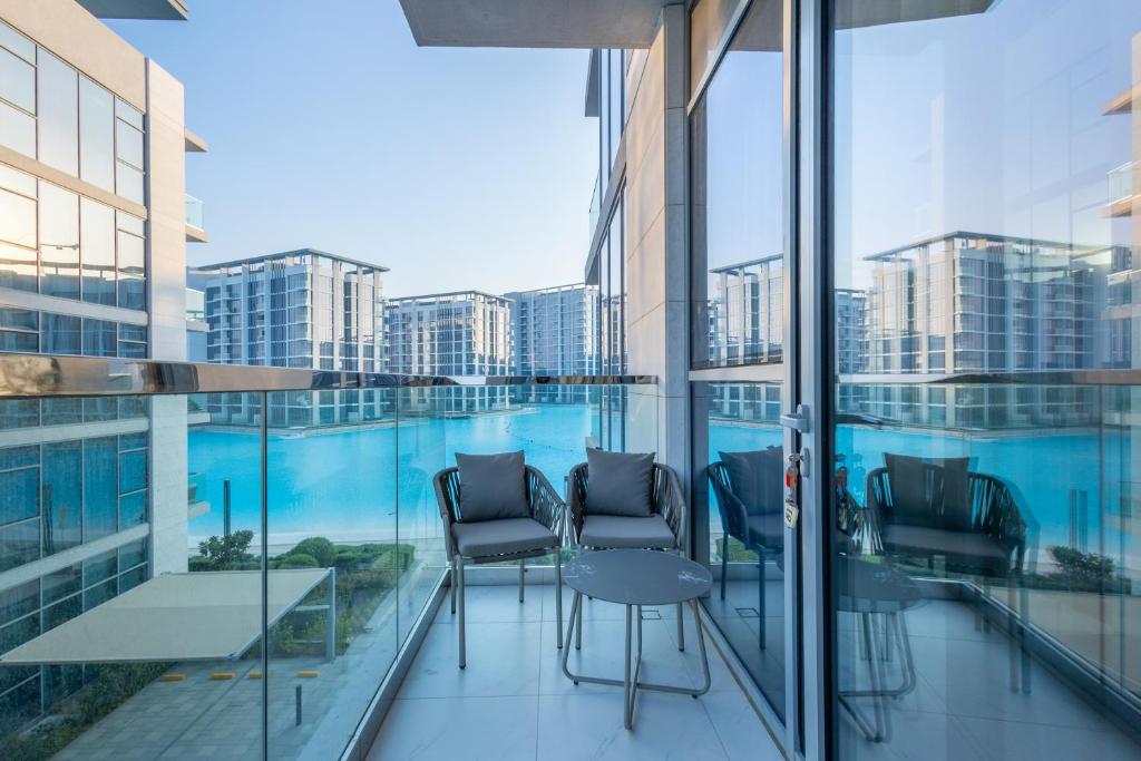 هتل سوپرهاست - سرین 1BR این دیستریک وان ویت آرتیفیشال بیچ - SuperHost - Serene 1BR in District One With Artificial Beach