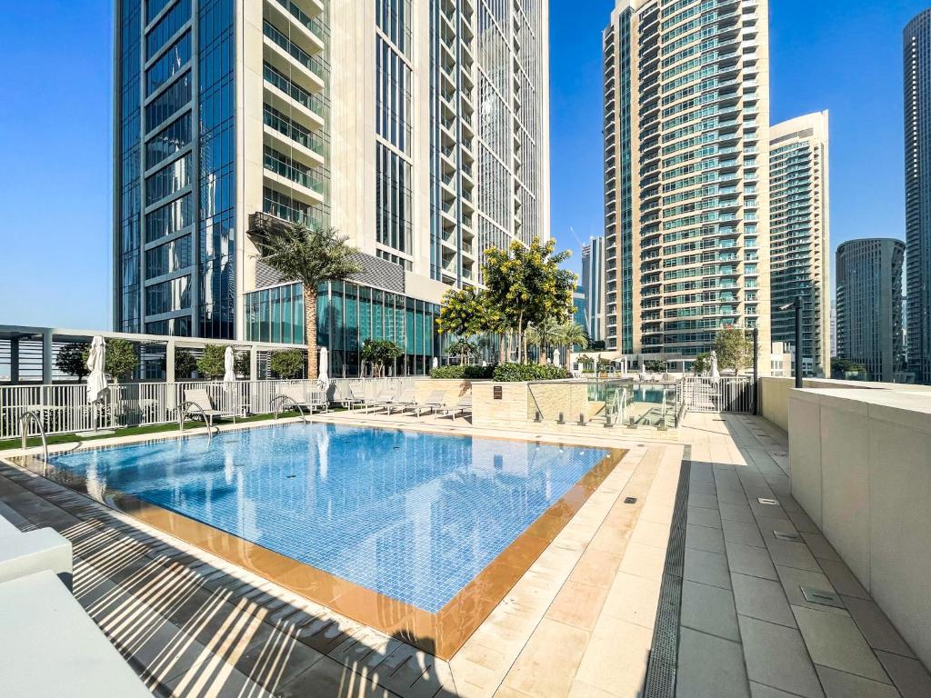 هتل کوزی آپارتمان وید سیتی ویوز نکس تو برج خلیفه 166FO1-2 - Cozy Apartment with City Views Next to Burj Khalifa 166FO1-2