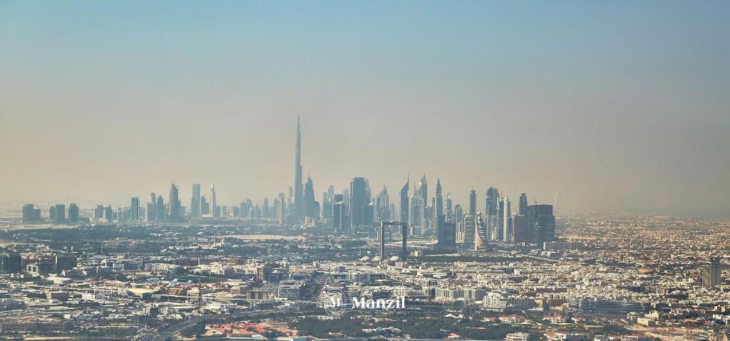 هتل منزل - استودیو هوم این برج ویو نیار دوبی میراکل گاردن اند دوبی اسپورتس سیتی - Manzil - Studio Home in Burj View near Dubai Miracle Garden and Dubai Sports City